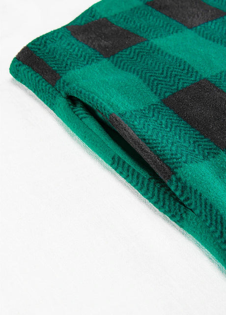 Close-up of the seam pocket of green sherpa lined plaid shacket for men