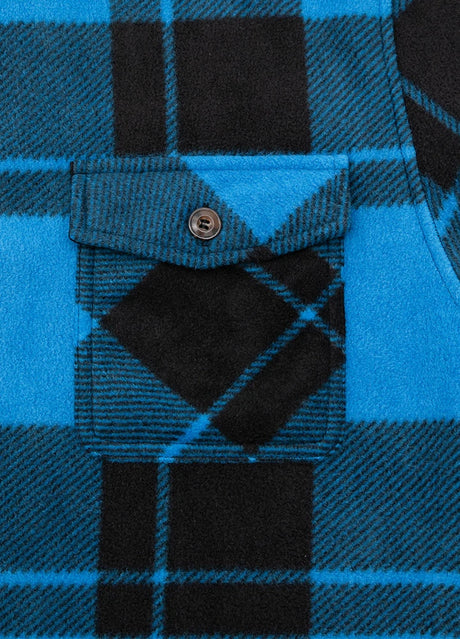 Close-up of the pocket of blue black button plaid shirt jacket for men