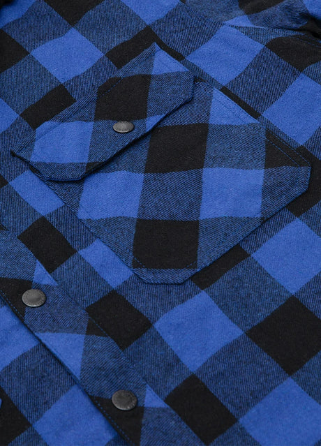 Close-up of the pocket of blue buffalo plaid men's quilted lined plaid flannel shirt jacket