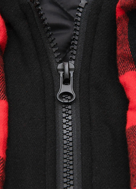 Close-up of the zipper of red buffalo plaid men's plaid hooded flannel shirt jacket  