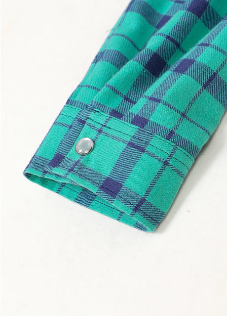 Kid's turquoise long-sleeve western shirt cuff detail