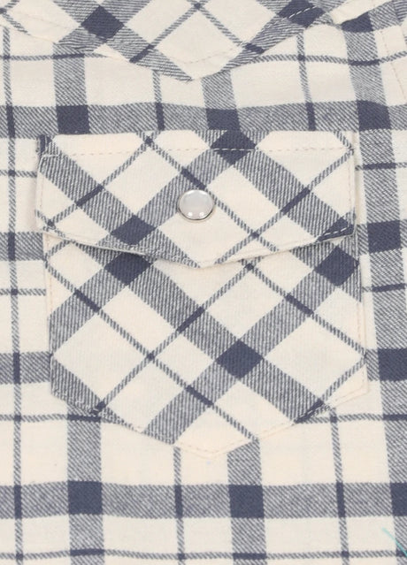 Detail of kid's beige long-sleeve western shirt pocket with button