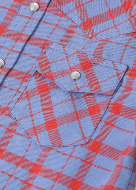 Detail of kid's cornflower blue long-sleeve western shirt pocket with button