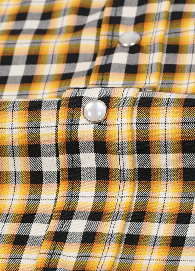 Close-up of the snap button of bumblebee men's western short sleeve shirt 