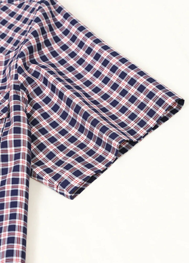 Close up of the cuff of navyberry men's western short sleeve plaid shirt