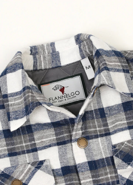 Detail of kid's azure mist plaid shirt jacket with snap button front closure