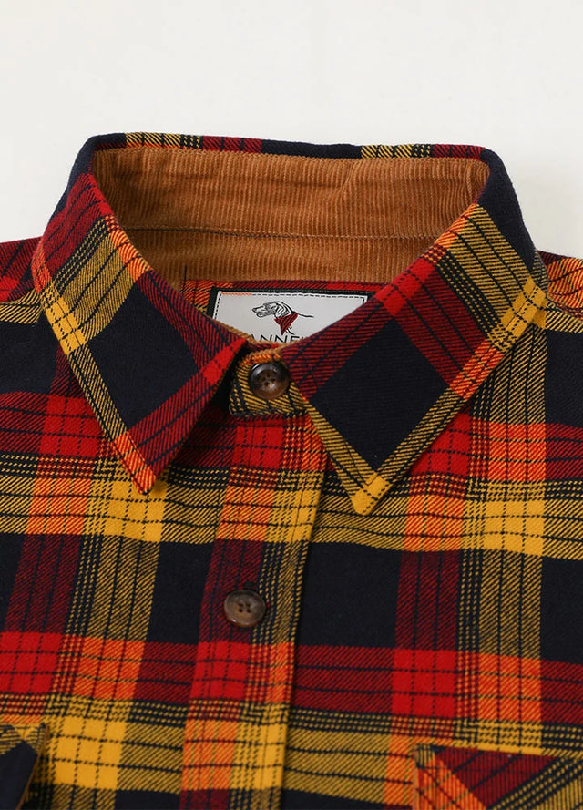 Close-up of the lapel of autumn leaf red men's timberline flannel shirt 