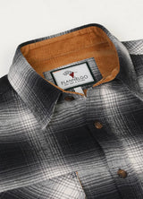 Close-up of the lapel of gray white men's timberline flannel shirt 