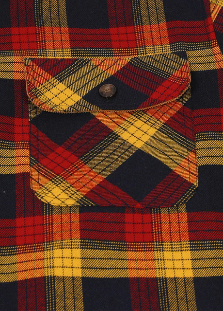 Close-up of the pocket of autumn leaf red men's midweight plaid flannel shirt