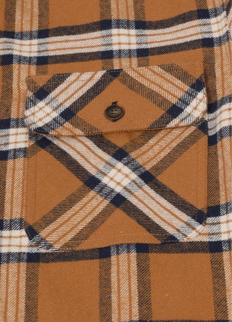 Close-up of the pocket of baked clay men's midweight plaid flannel shirt