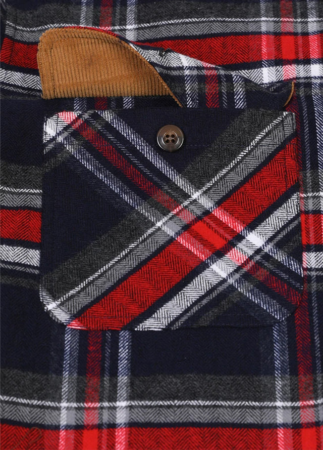 Close-up of the pocket of navy red men's midweight plaid flannel shirt