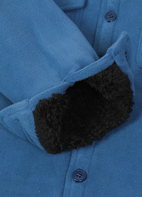 Close-up of the interior cuffs of kids light blue flannel jacket