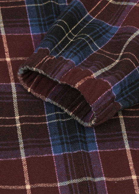 Close-up of the cuff of raspberry blue men's cozy zip up plaid jacket