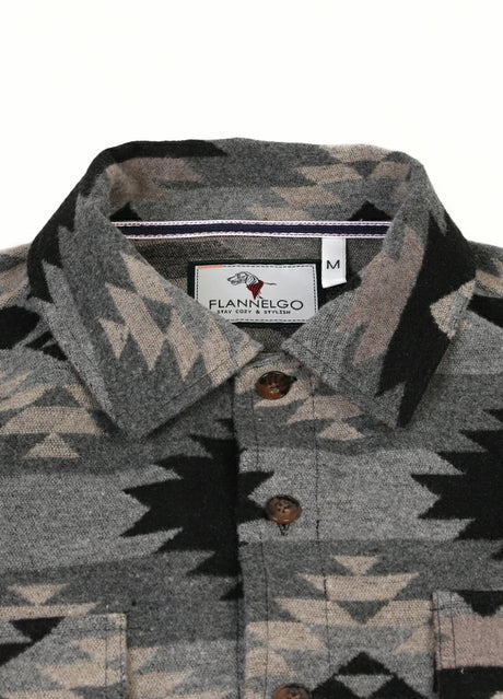 Detail of black grey men's aztec shirt jacket with cozy collar