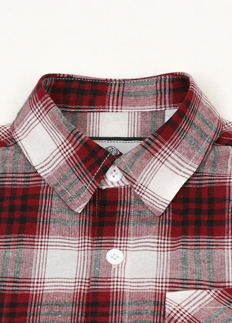 Detail of kids short sleeve flannel shirt with buttoned front closure