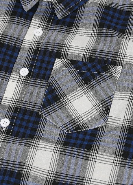 Detail of pocket detail on a soft flannel short sleeve shirt for kids