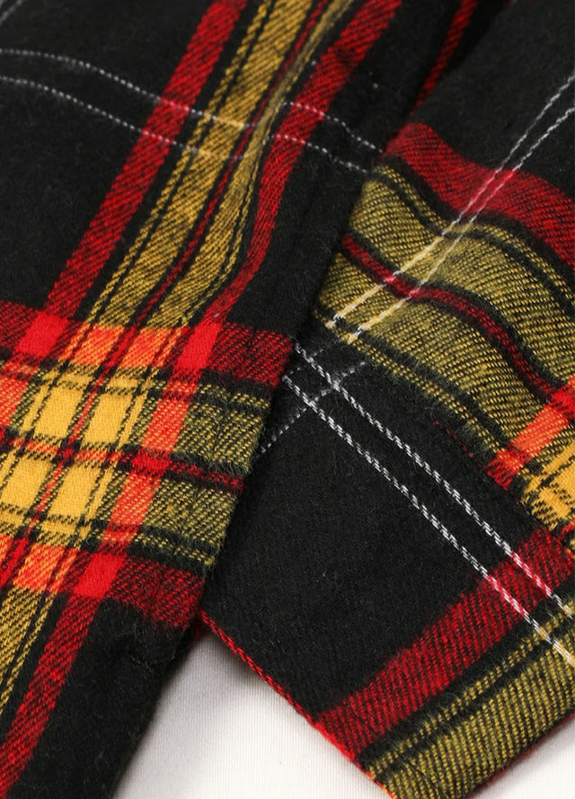 Close-up of boys ebony gold flannel jacket exterior fabric