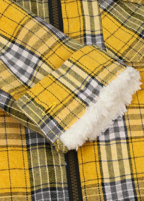 Close-up of the interior of boys full zip flannel jacket with cuff