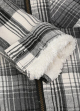 Close-up of the interior of boys flannel jacket with cuff