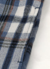 Zoomed-in view of side pocket on a boys flannel jacket