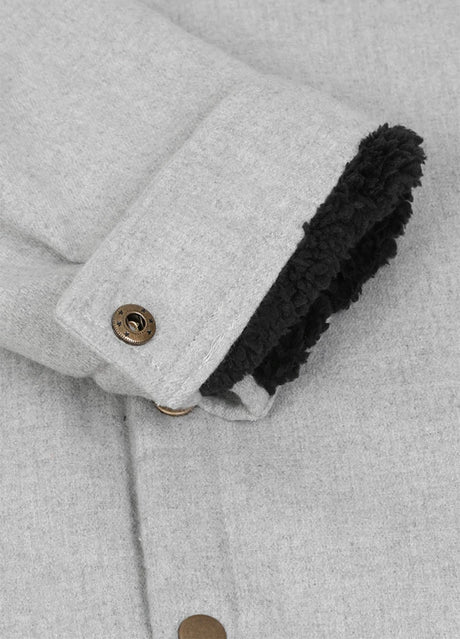 Close-up of the cuff of ash men's thick flannel cotton jakcet with sherpa lining 