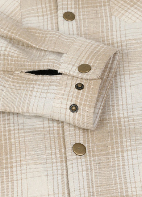 Close-up of the cuff of desert glow men's thick flannel cotton jacket with sherpa lining