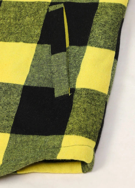 Close-up of the hand pocket of yellow black men's warm flannel jacket with sherpa lining