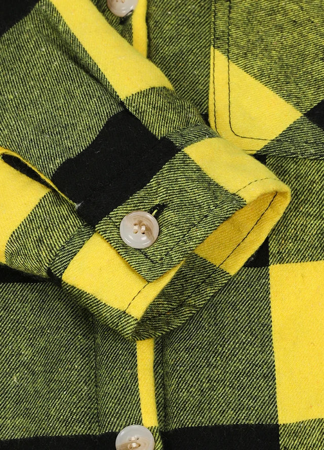 Close-up of boys yellow black flannel jacket with cuffs