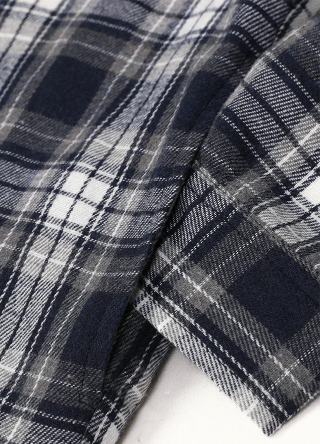 Close-up of boys navy grey flannel jacket with side pocket