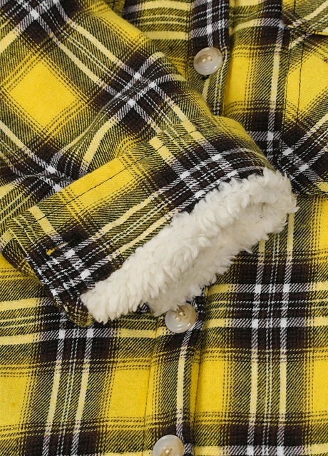 Close-up of the interior cuffs of  kids autumn grid flannel jacket