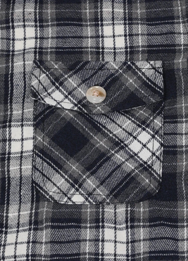 Zoomed-in view of pocket on boys navy grey flannel jacket