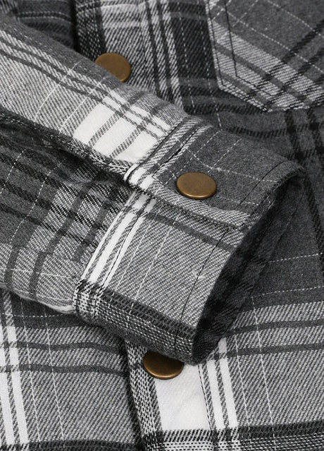 Close-up of cuff with button on kids slate gray flannel jacket 