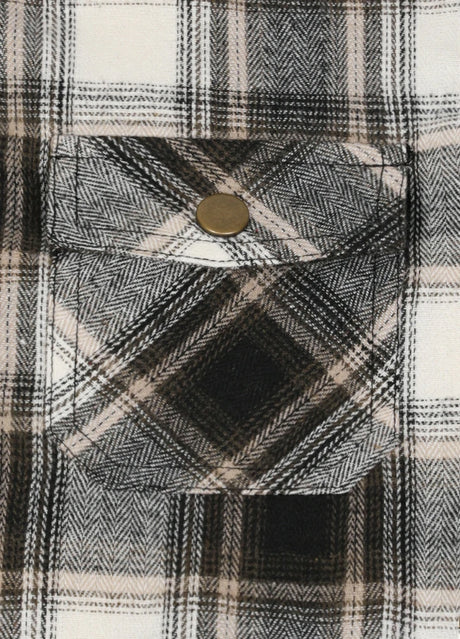 Detail view of kids white plaid flannel jacket pocket with button