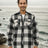 A man standing on the beach in a midnight snowfall men's fleece lined flannel shirt jacket