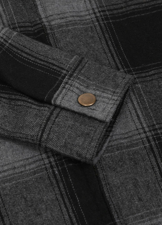 Close-up of kids medium gray full zip flannel jacket cuffs with button