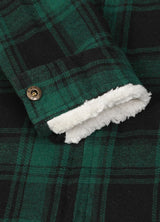 Close-up of the interior of kids dark green flannel jacket with cuffs