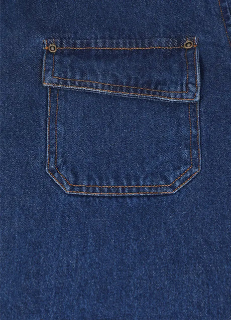 Close-up of the pocket of blue men's classic denim flannel lined shirt jacket 