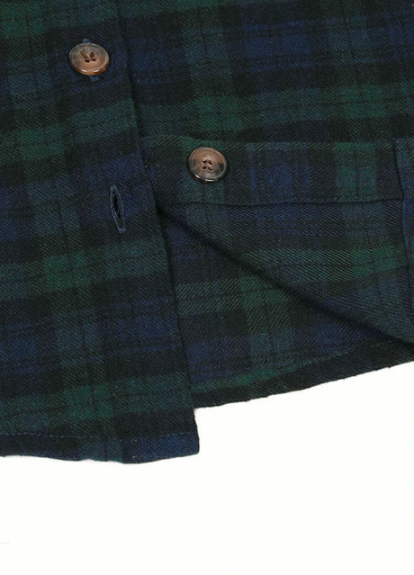 Detail of kids emerald seas flannel plaid shirt with shirttail hemline