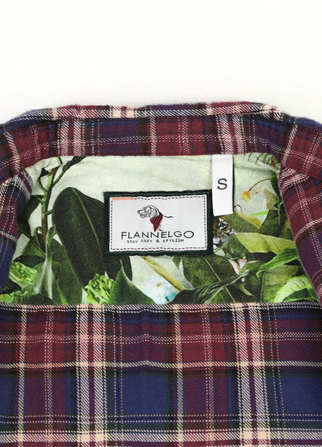 Detailed view of kids flannel plaid shirt collar with wildlife pattern