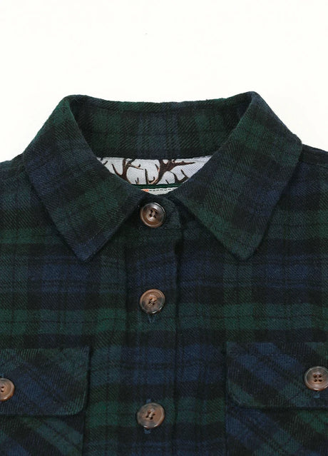 Detail of buttoned front closure on kids emerald seas flannel plaid shirt