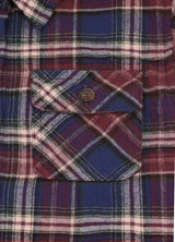 Close-up of pocket with button on kids blueberry red flannel plaid shirt