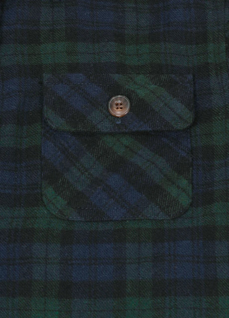 Close-up of pocket with button on kids emerald seas flannel plaid shirt