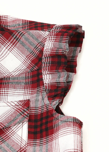 Detail of sleeveless falbala design on kid's wine sleeveless plaid vest 