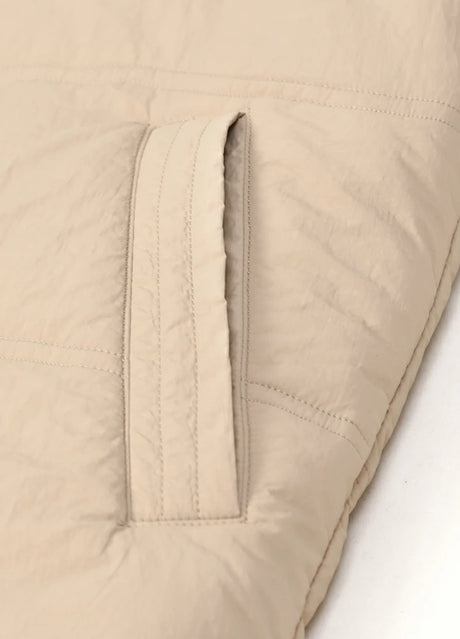 Close-up of the hand pocket of light khaki zipper flannel lined puffer vest for men