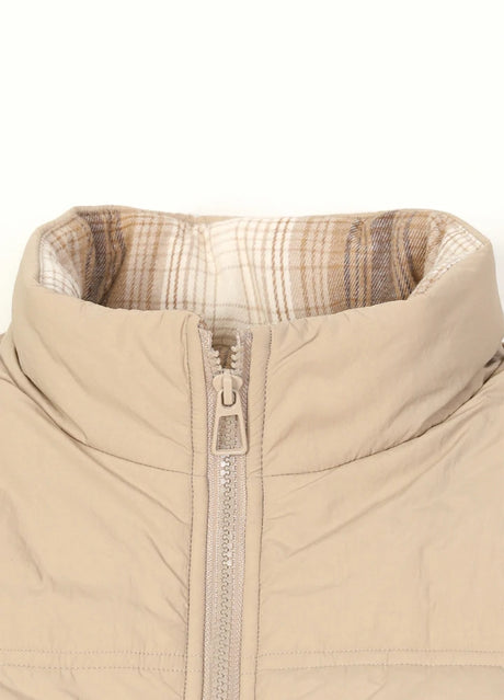 Close-up of the collar of light khaki men's zipper flannel lined puffer vest