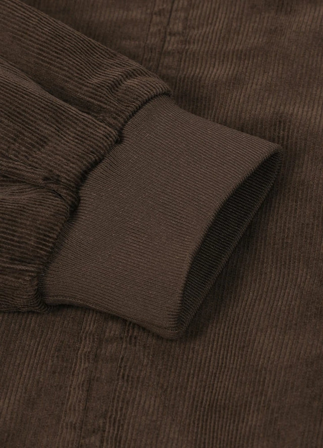 Close-up of the cuff of vintage brown men's winter vintage corduroy solid jacket