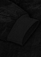 Close-up of the cuff of black men's winter vintage corduroy solid jacket