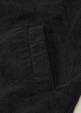 Close-up of the hand pocket of black men's warm corduroy solid jacket 