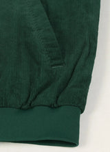 Close-up of the hem of a moss winter corduroy solid jacket for men