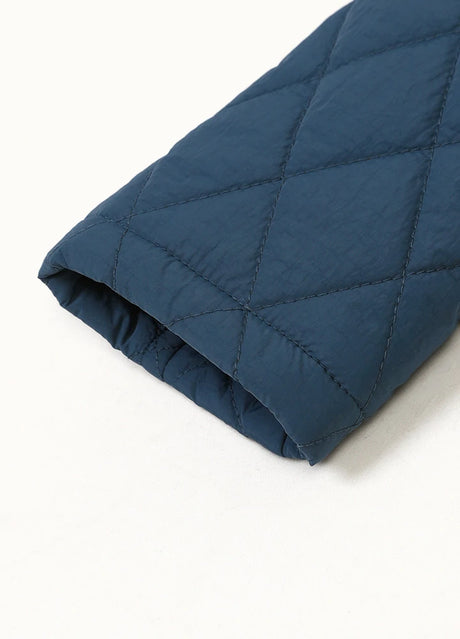 Close-up of cuff on kid's navy flannel lined shirt jacket